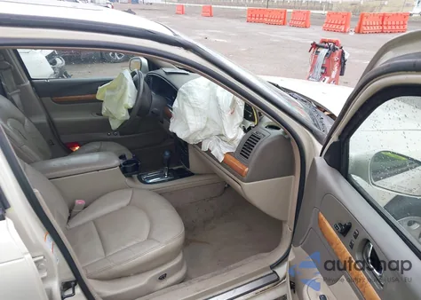 2002 Lincoln Continental from USA, damaged, VIN 1LNHM97V92Y697620